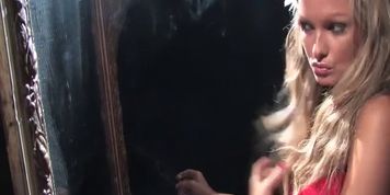 Beautiful blonde girl Emma smoking sexy while putting on makeup
