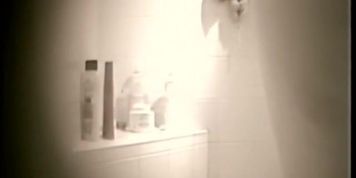 Hidden cam shower girl with the adorable hairy cunt