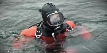 Sexy scuba girl in viking drysuits and mask 2