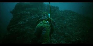 Woman Goes Diving in Heavy Suit but has Trouble Breathing in the End