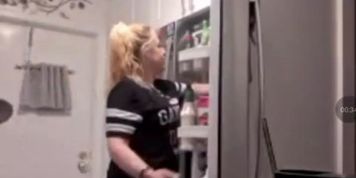 Rhea watches me jerk off to her while she is in the kitchen eating and cleaning