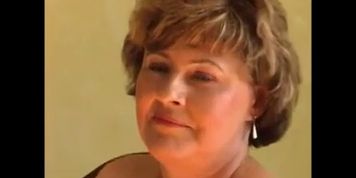 Older lady masturbating on a chair with dildo and reach a great orgasm