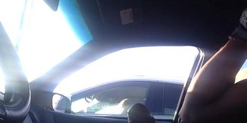 Car flashing mature lady