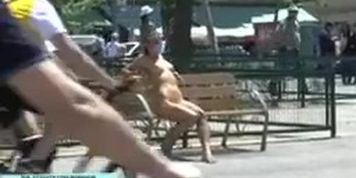 Naked hottie walks through city
