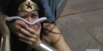 Wonder woman and bat girl in bondage