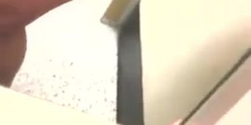 Girl in changing room films on her phone