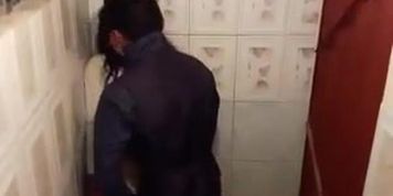 Drunk couple having sex in public bathroom