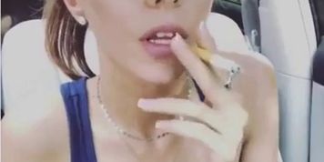 Gorgeous young brunette girl smoking sexy