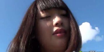 Asian rubs pussy close up