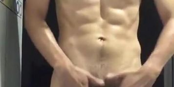Hot latino guy playing with his big cock at the gym shower 