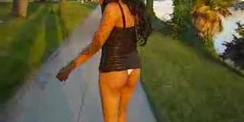 walking down the street showing petite ass