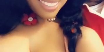 Nicki Minaj nipple slip tits flashing 