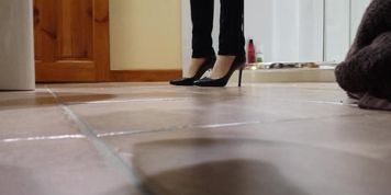 My wife getting ready to go out, she was reluctant to wear the shoes I had cum in earlier that day.