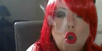 BBW Redhead Mistress Tina Snua Smokes A Slim Cigarette