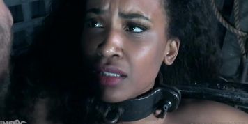 A Policewoman In Metal Bondage