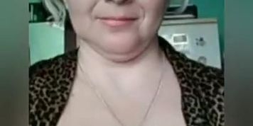 Russian woman undresses in front of the camera and masturbates
