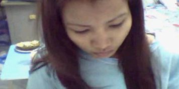 Thai girl getting naked & showing pussy on webcam