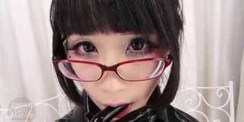 Asian girl in latex fingerlicking
