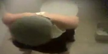 Three girls caught pissing in a public wc