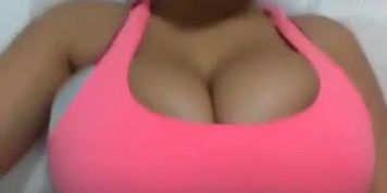 Busty latina jiggling huge boobs