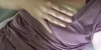 Horny female rubs boobs 