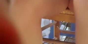 Greek hotty is sitting and getting upskirt between legs shot