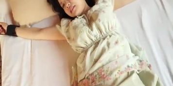 Woman gets bed tickled in different outfits