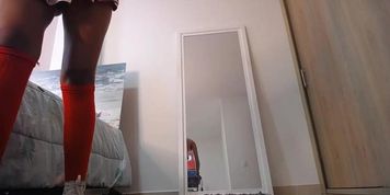 Latina cheerleader shows her pussy on cam