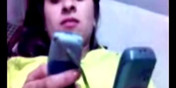 Dashing Arab girlfriend smiles while stroking boyfriend hard dick