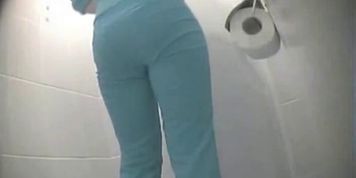 Hairy pussied slim girl takes her pants down