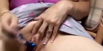 Chubby amateur MILF fucks her wet pussy with her favorite