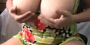 mom takes off clothes and shows her big tits on webcam