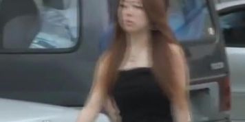 Fanciful oriental sweetie loses her sexy skirt when someone grabs it