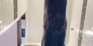 Dildo screw in the shower