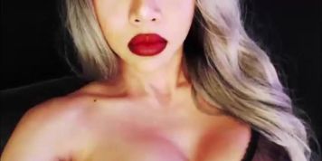 Tranny shows off her oral skills by sucking a dildo