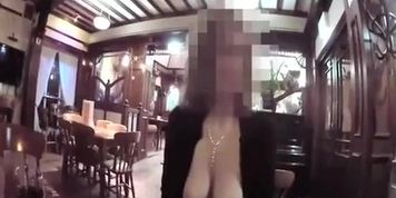 Exhibitionist boobs out in restaurant