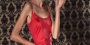 Anorexic MILF in red