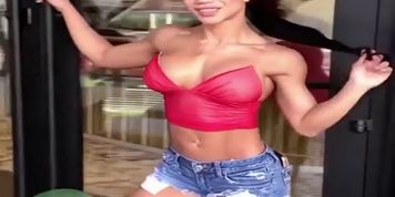 Muscular Tins Nguyen teasing and flexing her rough muscles