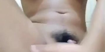 Asian teen masturbating in bathroom