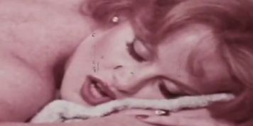 Two hot lesbian sluts and a double ended dildo in vintage sex scene (Lisa DeLeeuw)