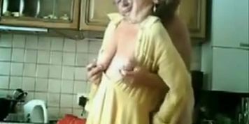 Mum and dad having fun in the kichen. Stolen video