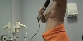Topless changing room woman with the hairdryer