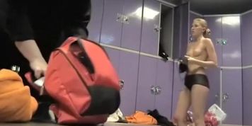Model looking blonde spied topless before dressing on