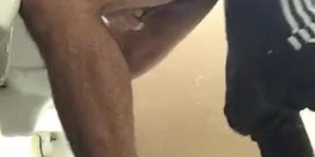 Guy fucks a hairy man and cums in his ass in public bathroom