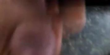 Masturbating