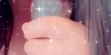 Cute glasses girl with big boobs sucking off her toy sub to OF for full play video