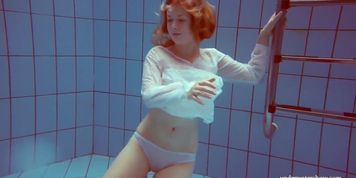 Hot girl Melisa Darkova dressed underwater