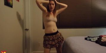 Skinny Redhead Dancing And Stripping