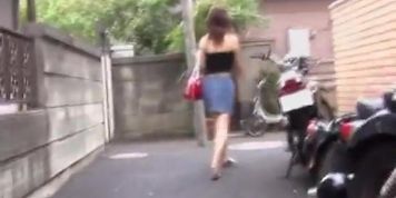 Busty Japanese girl spied on while walking home