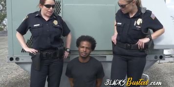 These horny female cops are taking their black suspect to the rooftop to suck his BBC
